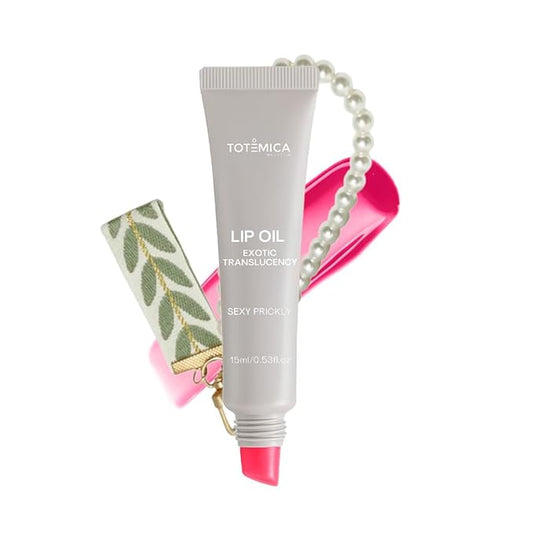 TOTEMICA Lip Oil for women by Ana Patricia, Hydrating Exotic Translucency, Glossy Lip Balm Shine with Shea Butter & Jojoba Oil, Non-Sticky with Nourishing Finish | Sexy Prickly with Charm