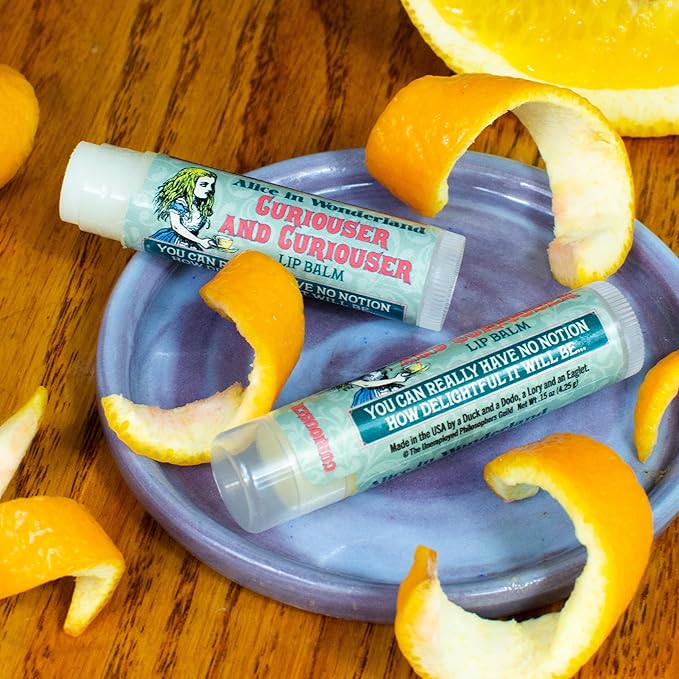 The Unemployed Philosophers Guild Alice in Wonderland Curioser and Curioser Lip Balm - Orange Marmalade Flavored, Cruelty-Free, Made in the USA
